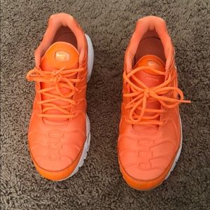 Bright orange Nike’s